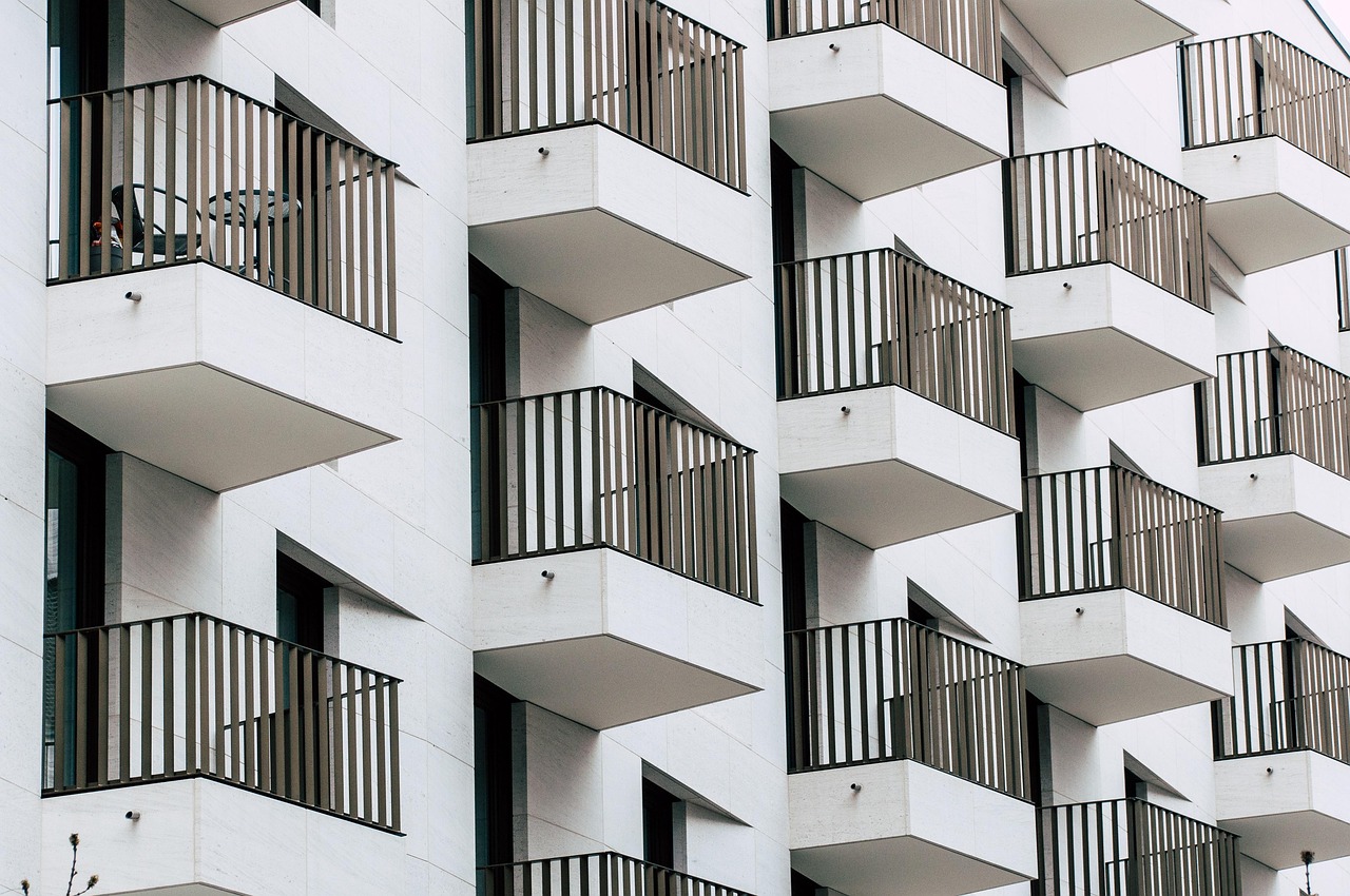 Apartment building facade with balconies representing Korean ho unit number system
