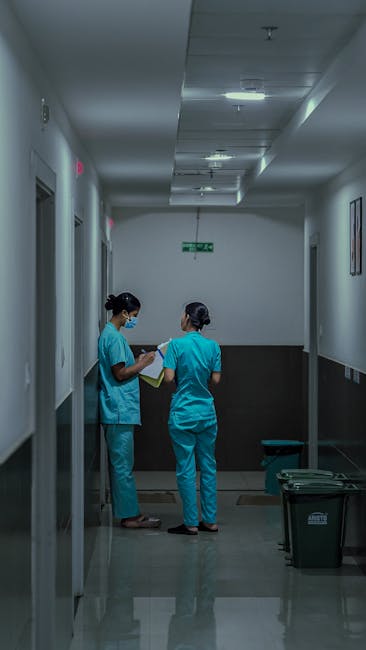 Korean hospital nurses in corridor — professional medical staff for foreigners