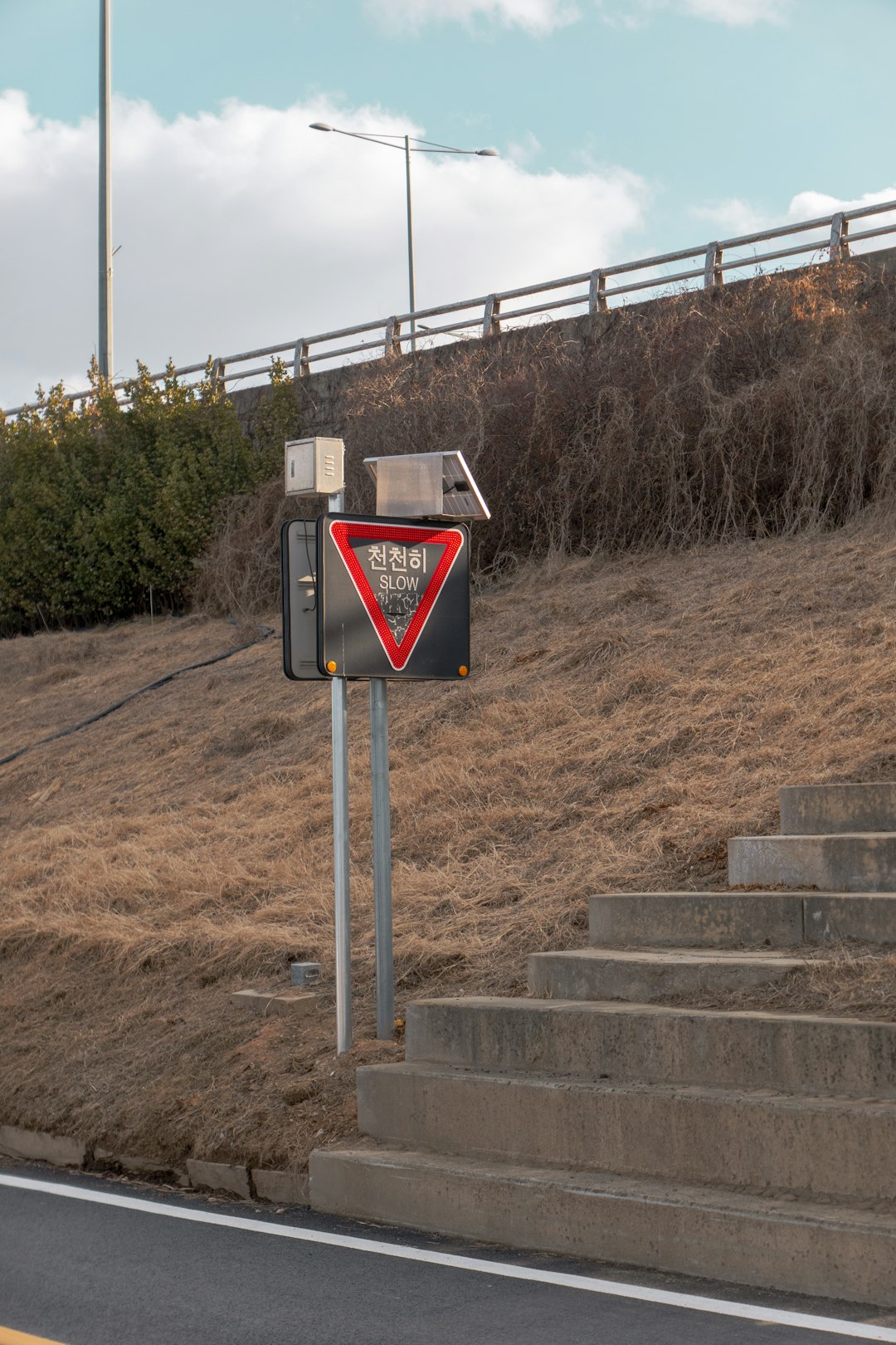 Korea neighborhood road sign illustrating doromyeong road name address system