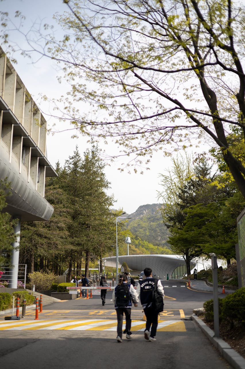 Students walking on Seoul National University campus in spring