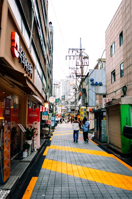 Vibrant street scene in downtown Seoul South Korea with Korean address signs
