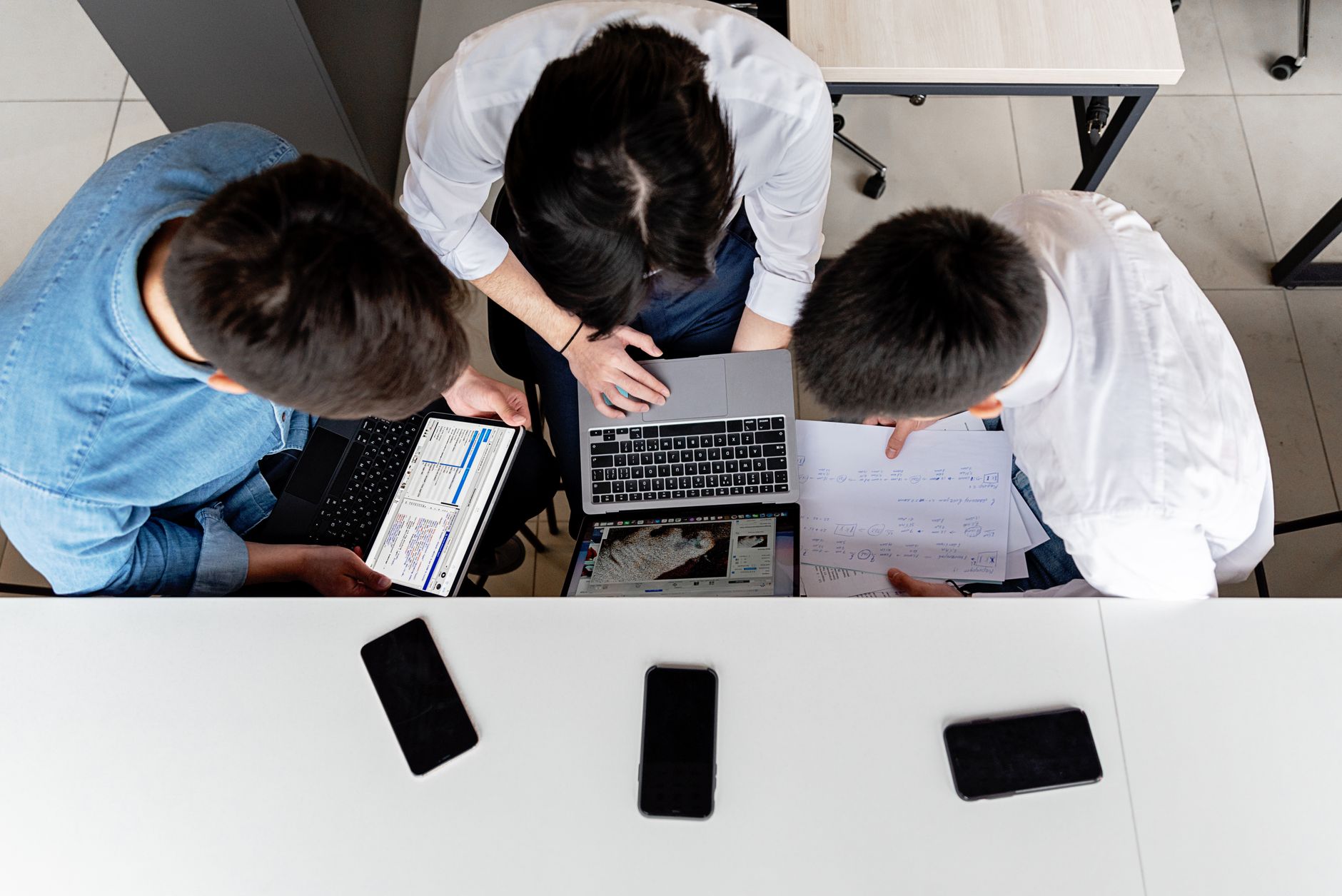 Content team reviewing AI-edited article drafts