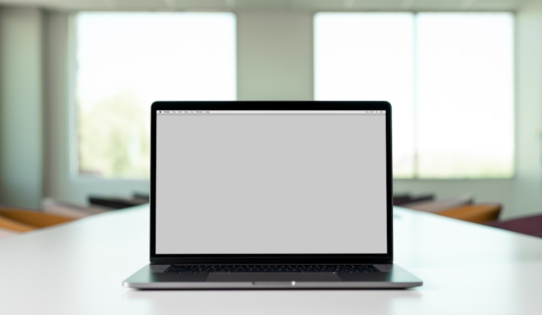 Proposal manager turning a request for proposal into a compliance matrix on a laptop