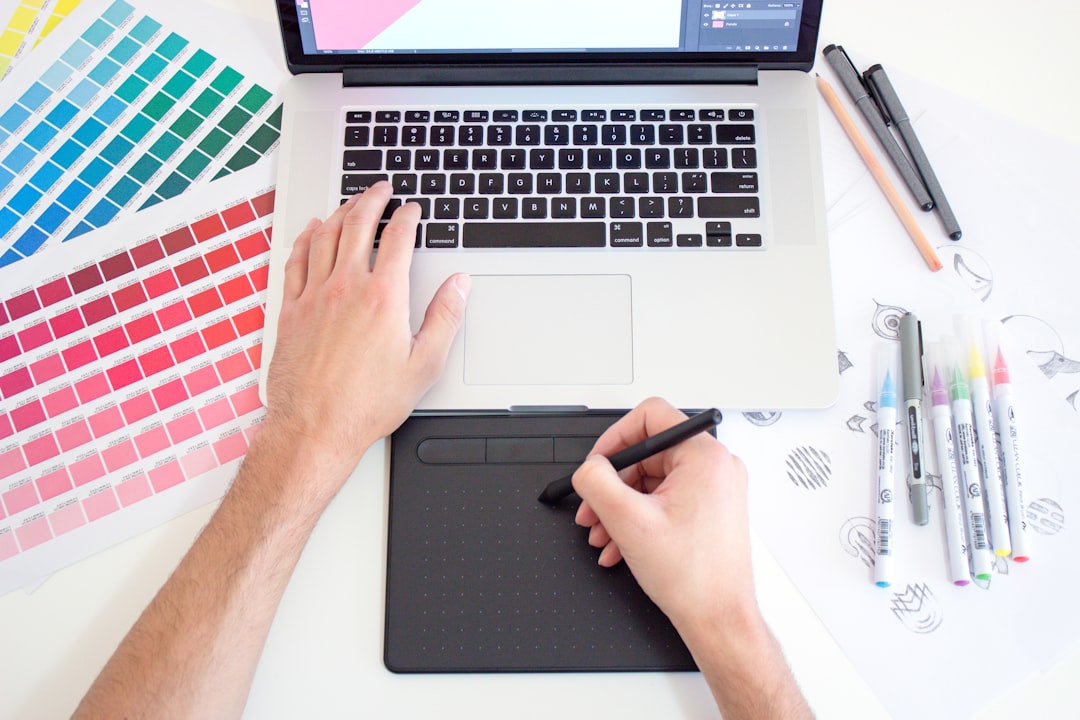 Designer adapting campaign visuals for several markets in an AI image localization workflow