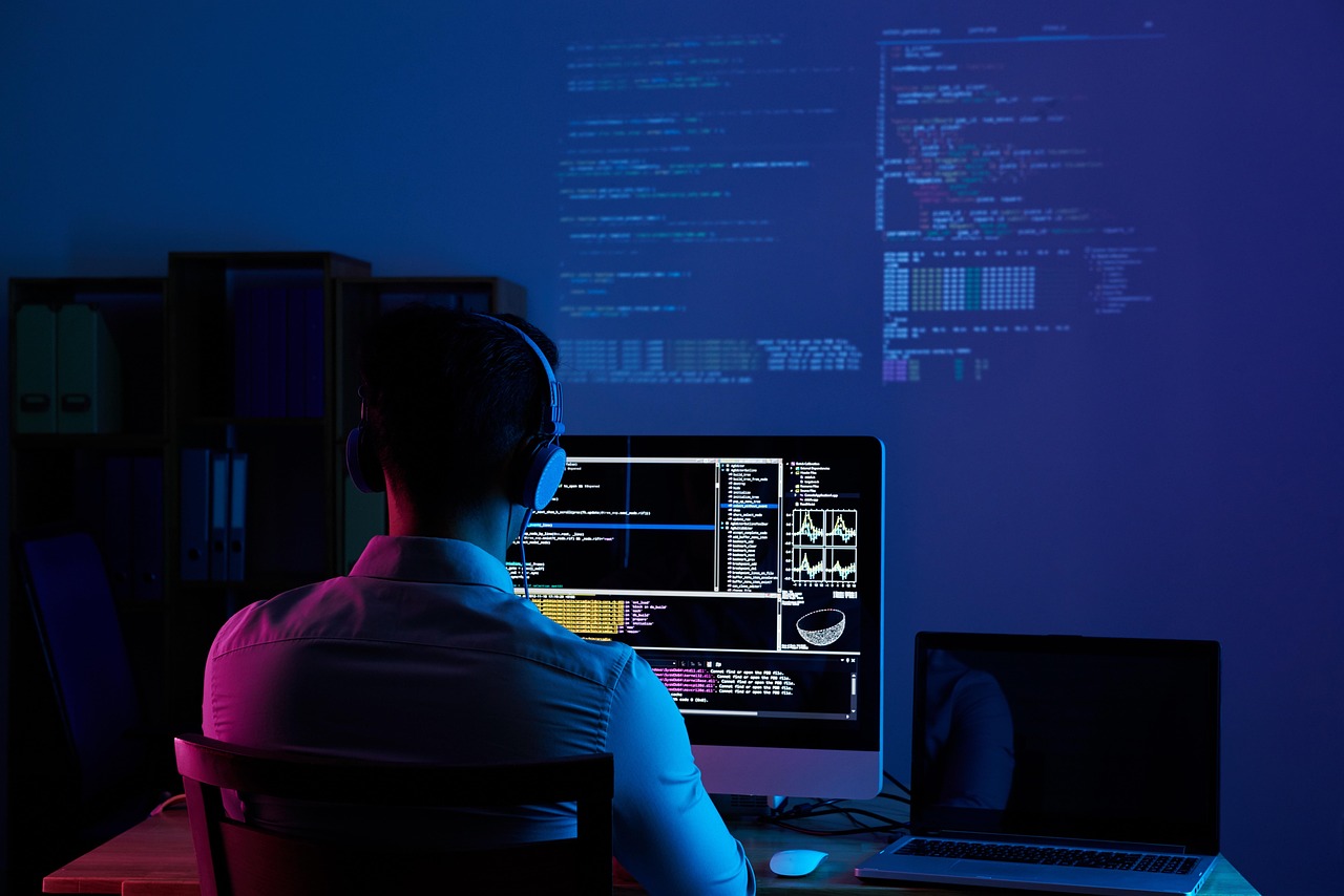 Engineering team reviewing an AI-assisted cross-package code change and test evidence